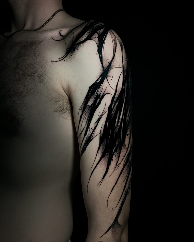 Tatuaje alas de murciélago en hombro